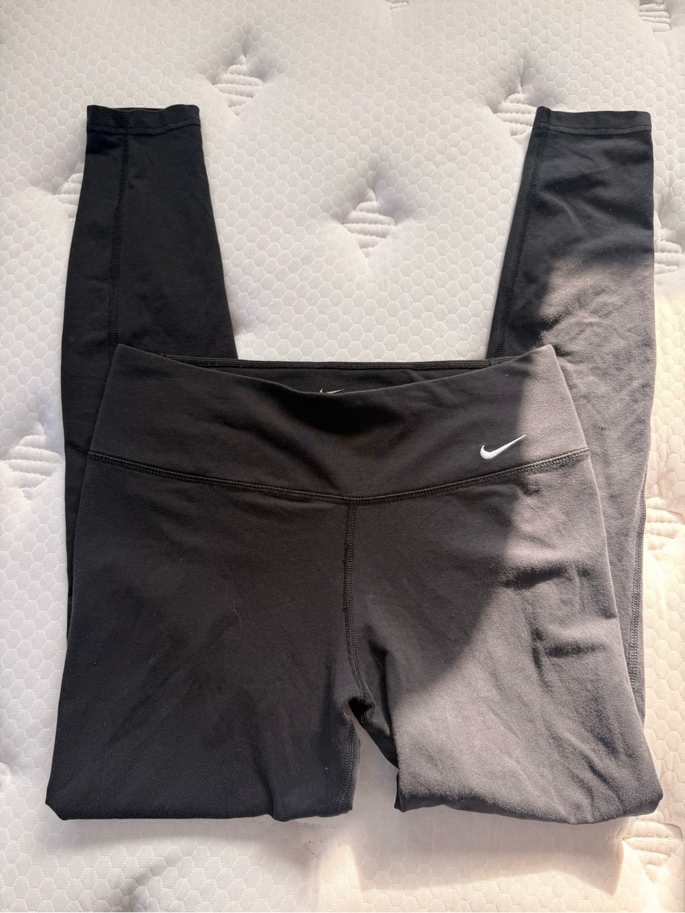 Nike Black High-Waist Performance Leggings with White Swoosh